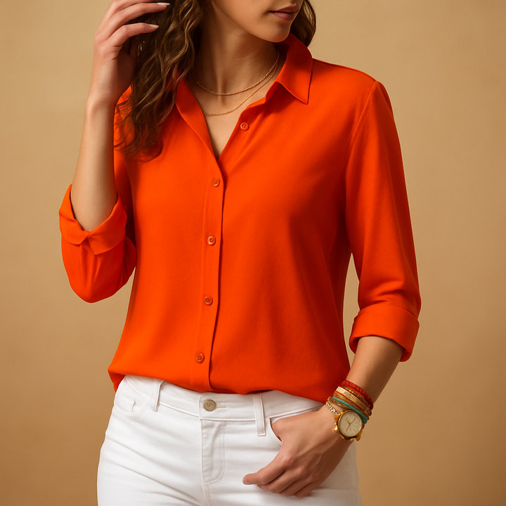 Stylish women's V-neck blouse with long sleeves and button front detail. Ideal elegant shirt for work.