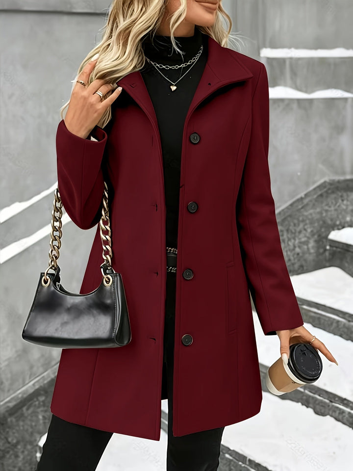 Sophisticated women's longline coat, single breasted, notch collar, a timeless piece for fall layering.