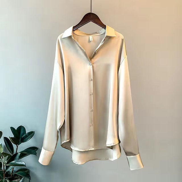 Chic women's satin shirt with a loose fit, button-down front, and long sleeves