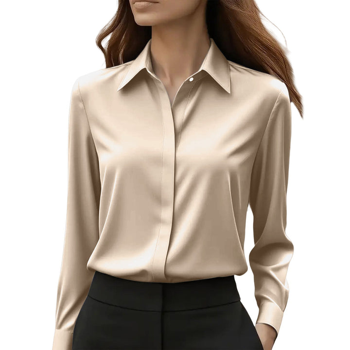 Detail shot: pearlescent buttons on the elegant women's luminous long sleeve professional blouse.