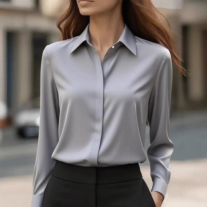 Women's elegant luminous button blouse, a stylish long sleeve top designed for comfort & professional flair.