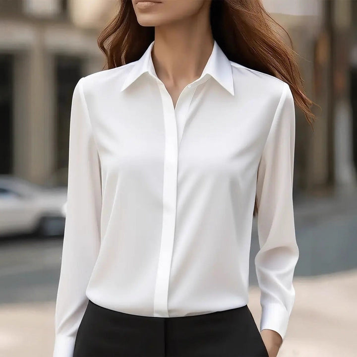 Versatile women's luminous long sleeve top, an essential button-up blouse for elegant office or casual styles.