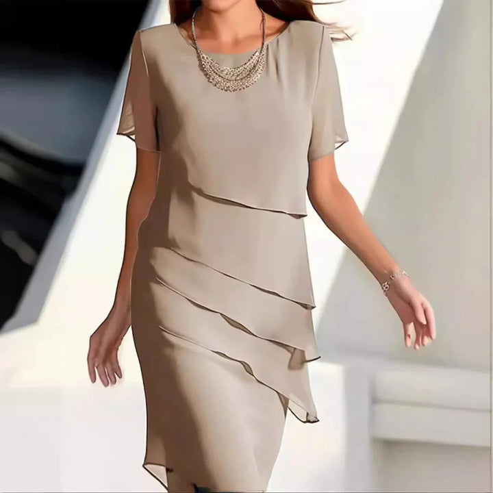 Elegant women's luxe midi dress with round neck & short sleeves, perfect for versatile summer and spring events.