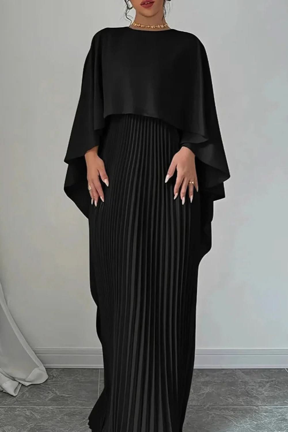 Back view of an elegant women's Luxe pleated cape maxi dress, a formal long gown perfect for evening events.