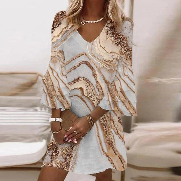 Elegant women's marble swirl flare sleeve mini dress, V-neck, relaxed fit. Perfect for stylish summer wear.