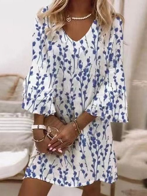 Women's elegant V-neck mini dress with a unique marble swirl print and trendy flare sleeves, perfect for events.
