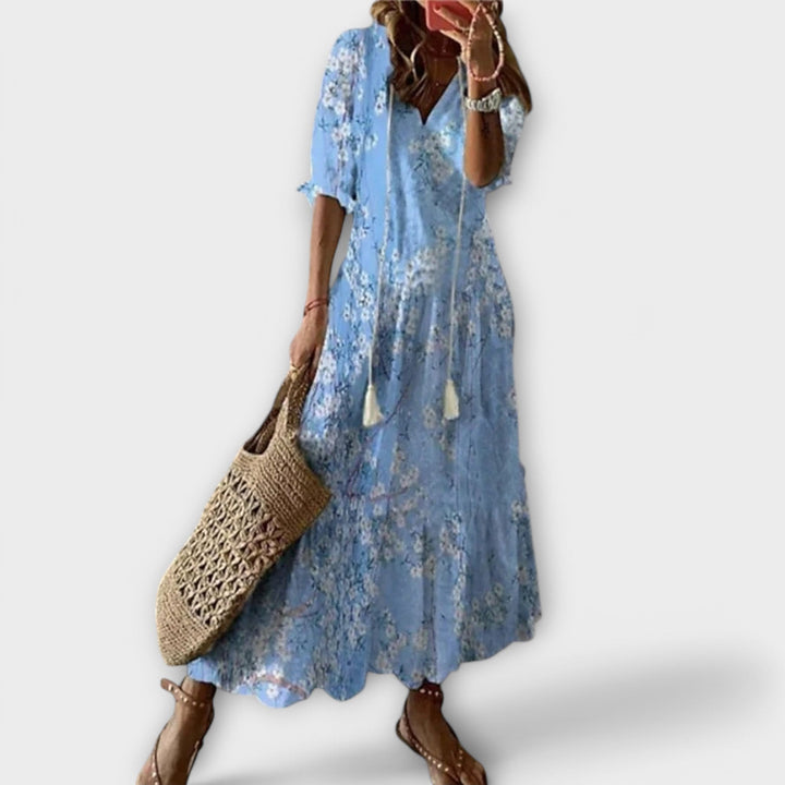 Versatile women's printed maxi dress, comfortable for casual wear, elegant events, or resort style.