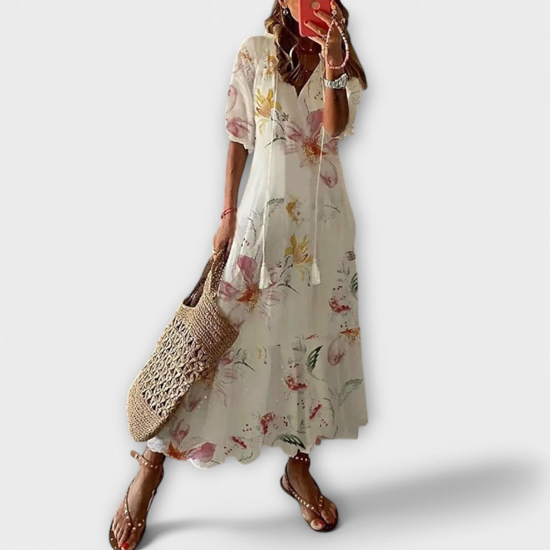 Beautifully printed elegant maxi dress for women, a stylish choice for any summer party or casual look.