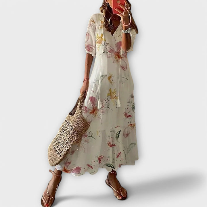 Beautifully printed elegant maxi dress for women, a stylish choice for any summer party or casual look.