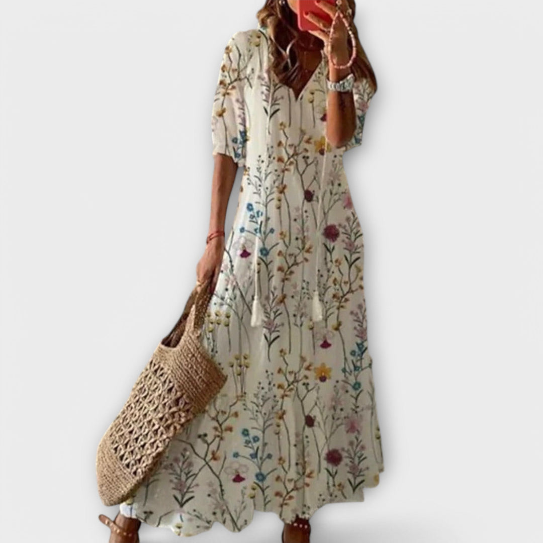 Stylish women's maxi dress; a comfortable, flowy design suitable for beach, casual, or elegant events.
