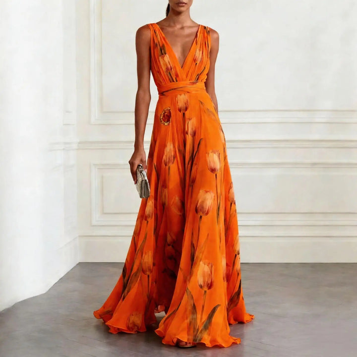 Full-length women's floral maxi dress in a tulip print, an elegant choice for a wedding guest or evening event.