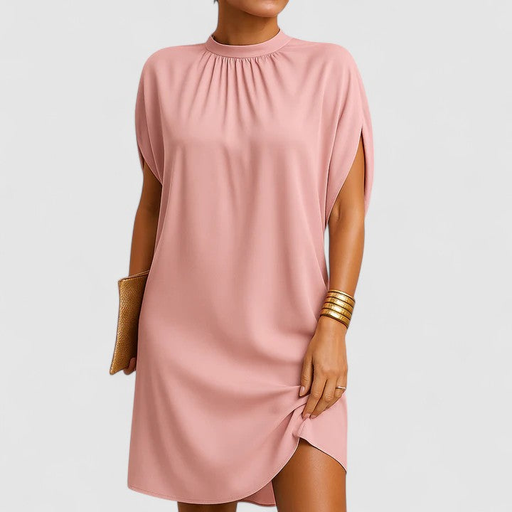 Elegant women's maxi dress with stylish shoulder cutouts, perfect for evening wear or a sophisticated party.