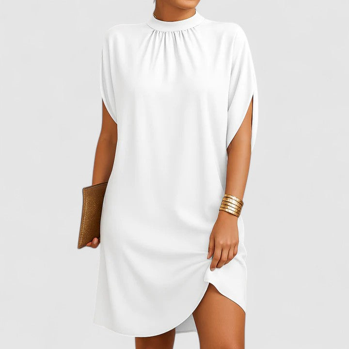 Chic women's maxi dress for summer fashion. Features elegant shoulder cutouts and a versatile, sophisticated look.