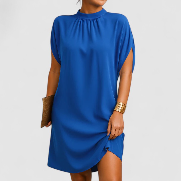 Long elegant women's dress with unique shoulder cutouts. Perfect maxi dress for evening wear or chic summer parties.