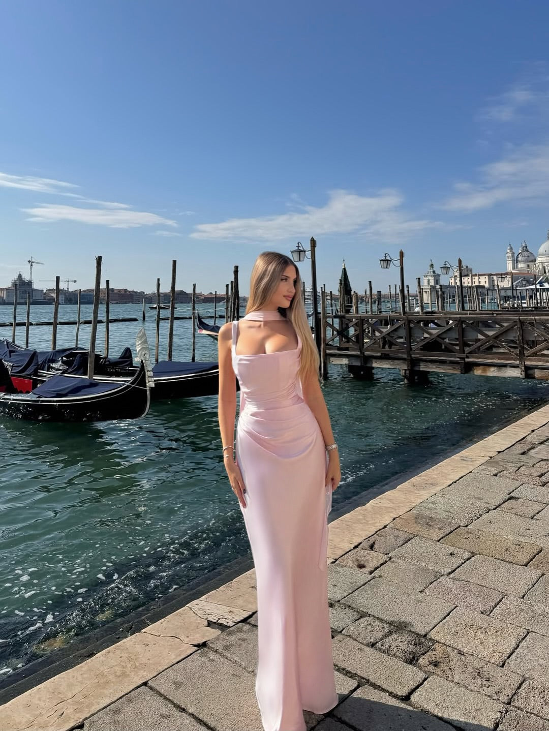 Women's elegant sleeveless maxi dress with open back & lace-up detail. Ideal for wedding guests, formal events & parties.