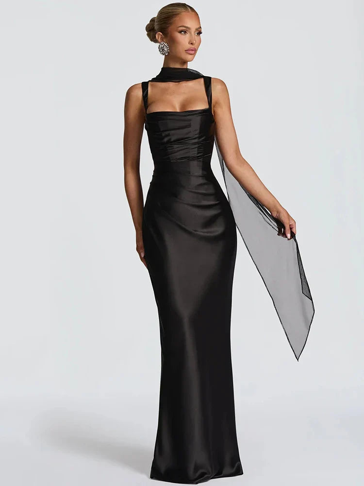 Women's open-back maxi dress with lace-up detail. Elegant wedding guest or special occasion gown, perfect for parties.