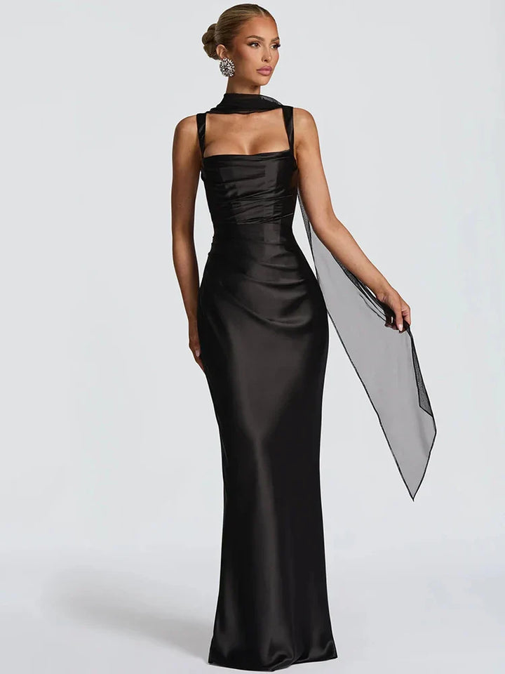 Women's open-back maxi dress with lace-up detail. Elegant wedding guest or special occasion gown, perfect for parties.