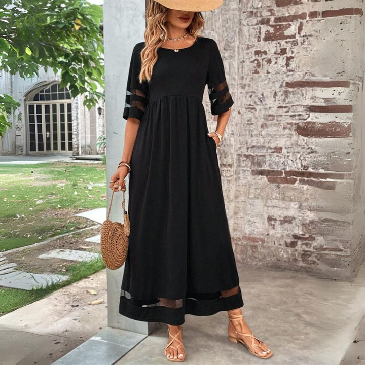Elegant women's mesh panel maxi dress with gathered waist, perfect for versatile occasion wear.