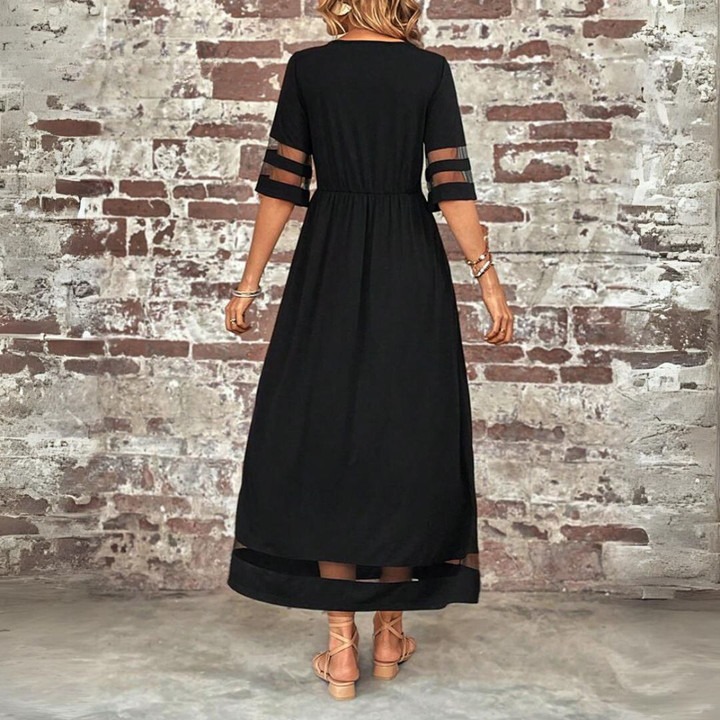 Beautiful women's long mesh panel maxi dress with a sophisticated gathered waist, ideal for fashion.
