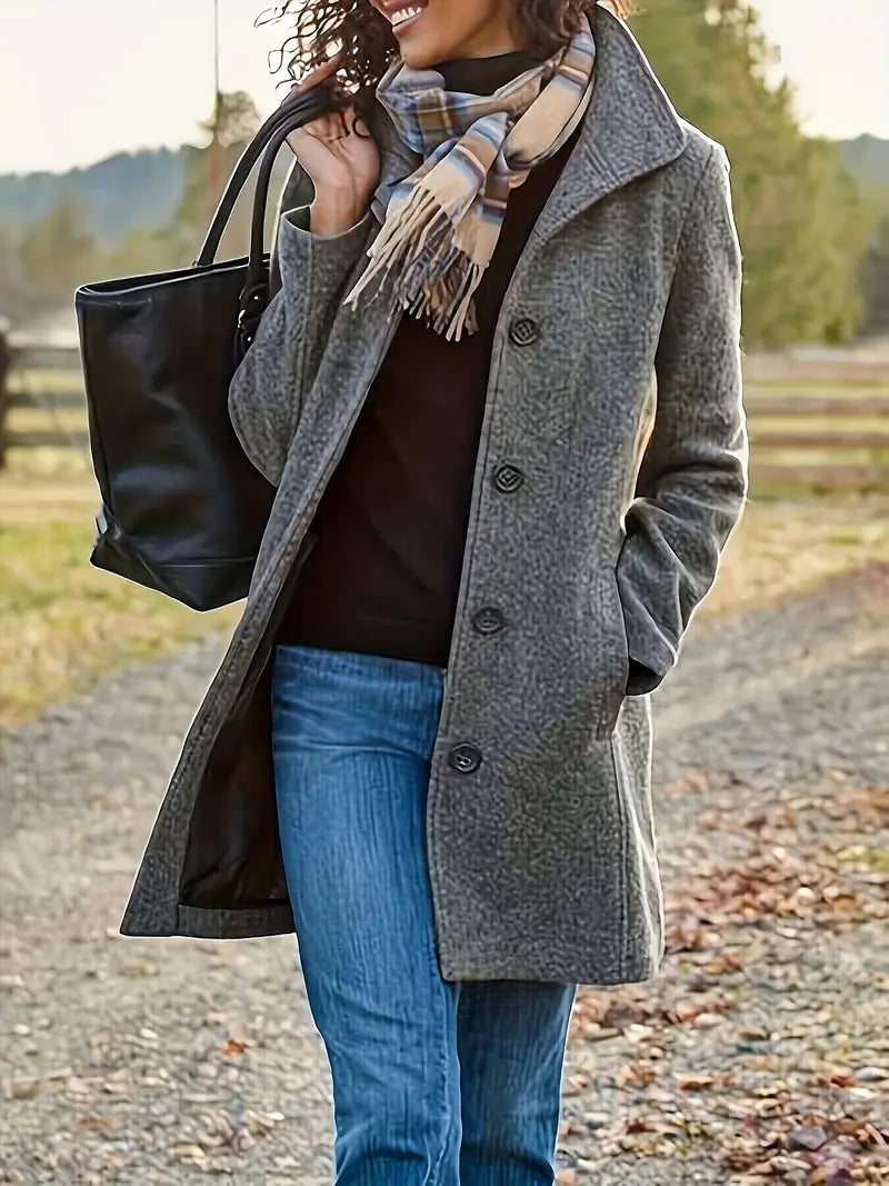 Stylish women's warm trench coat, featuring a classic lapel design & pockets, ideal for winter fashion.