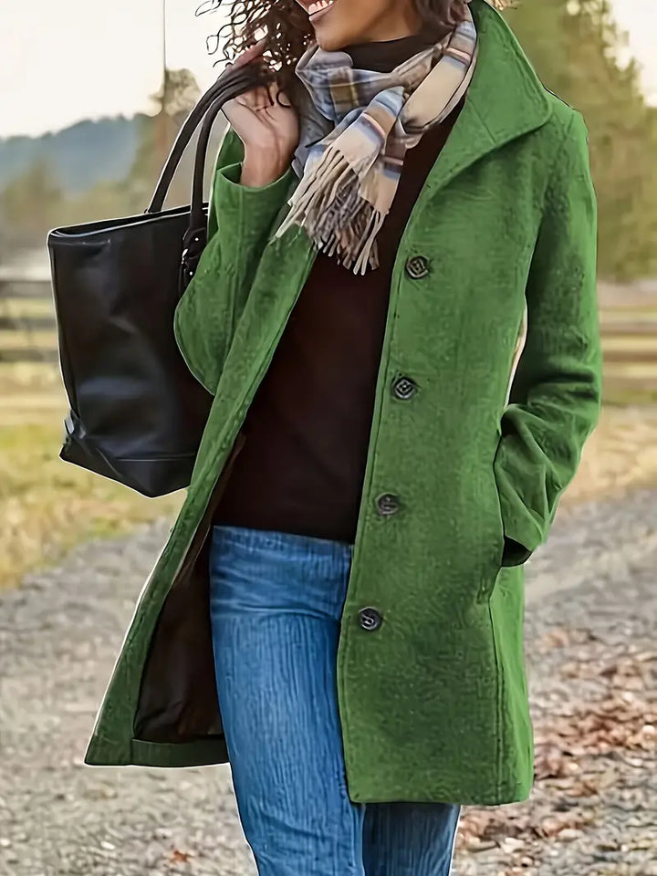 Women's elegant seasonal trench coat in a classic style with buttons, a must-have warm fall jacket.