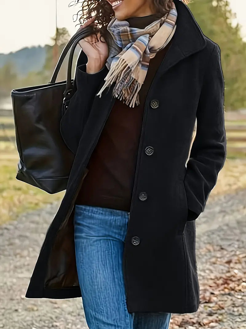 Chic women's mid-length button-down trench coat, a warm and stylish outerwear piece for various occasions.