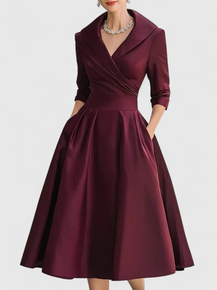 Fashionable women's elegant midi dress, offering a flattering silhouette for formal parties.