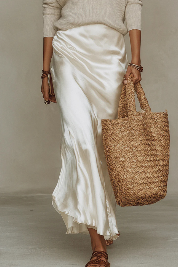Soft, elegant women's sweater, part of a midi dress set; ideal for layering & stylish coordinated looks.