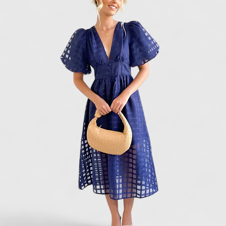 Stylish women's midi dress, an elegant choice for wedding guests & formal occasions. Flattering fit.