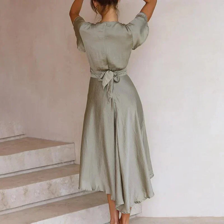 Versatile women's elegant midi dress with V-neck, tie front, and flutter sleeves. Great for summer, parties & occasions.