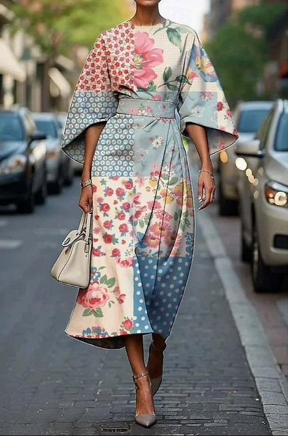 Flowy women's belted midi dress with kimono sleeves, ideal for elegant parties & day to night wear.