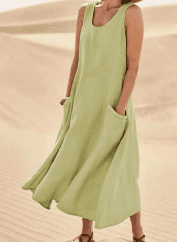 Midi length of an elegant women's sleeveless dress with pockets, ideal for sophisticated summer casual wear.