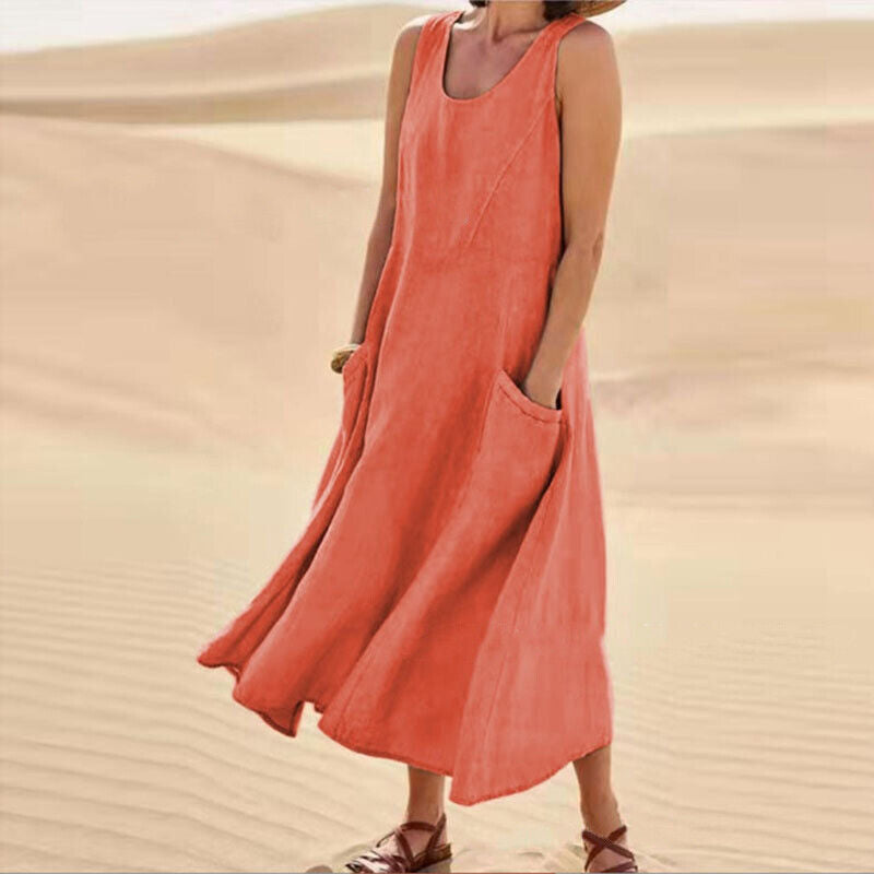 Women's elegant midi dress styled casually, featuring convenient pockets for a relaxed summer fashion look.