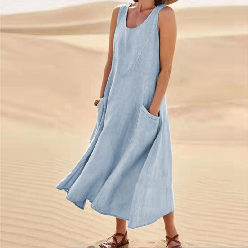 Fashionable women's elegant midi dress, a summer essential with practical pockets and comfortable design.