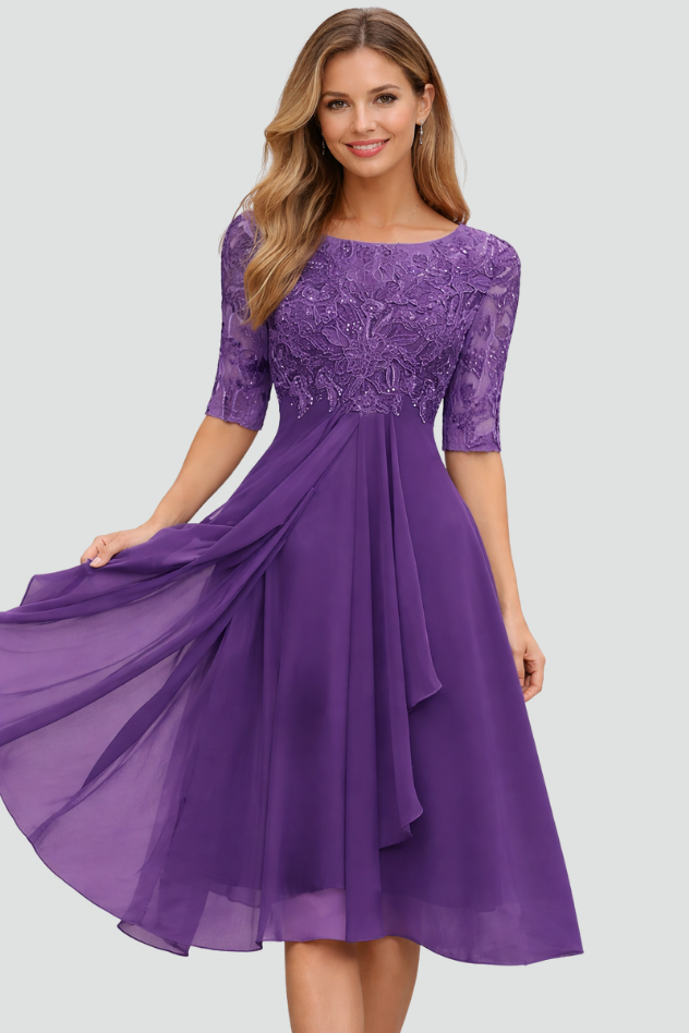 Stylish women's midi evening dress for special occasions, elegant design, comfortable three-quarter sleeves.
