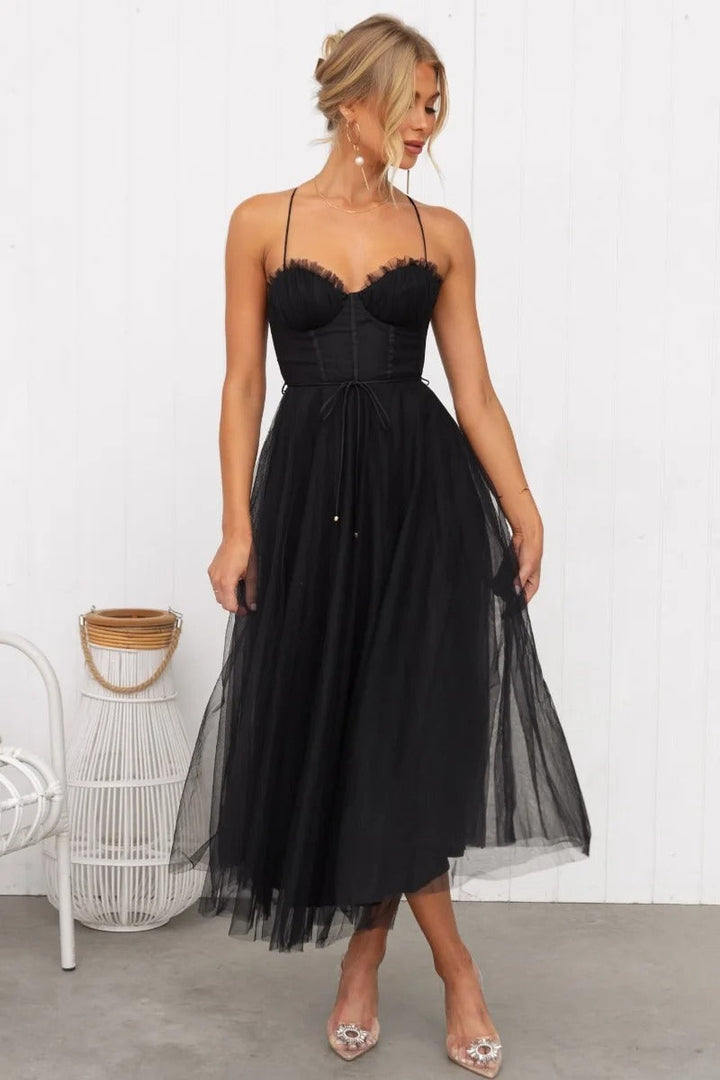 Chic women's formal party dress with spaghetti straps, sweetheart neckline, and a flattering corset tulle midi design.