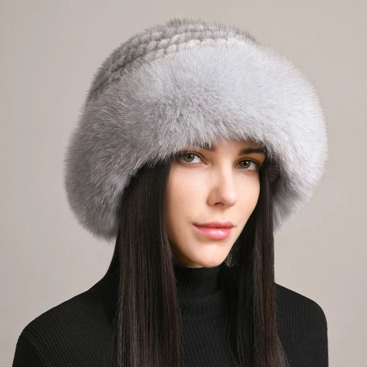 Close-up of a women's mink and fox fur hat, showcasing rich texture and luxury accessory