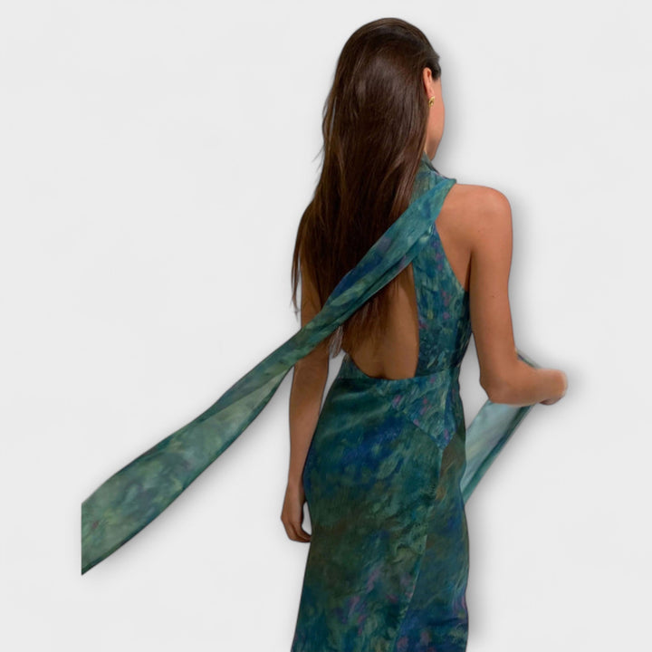 Art-inspired women's elegant Monet Iris print maxi dress, a sophisticated floral summer gown for events.