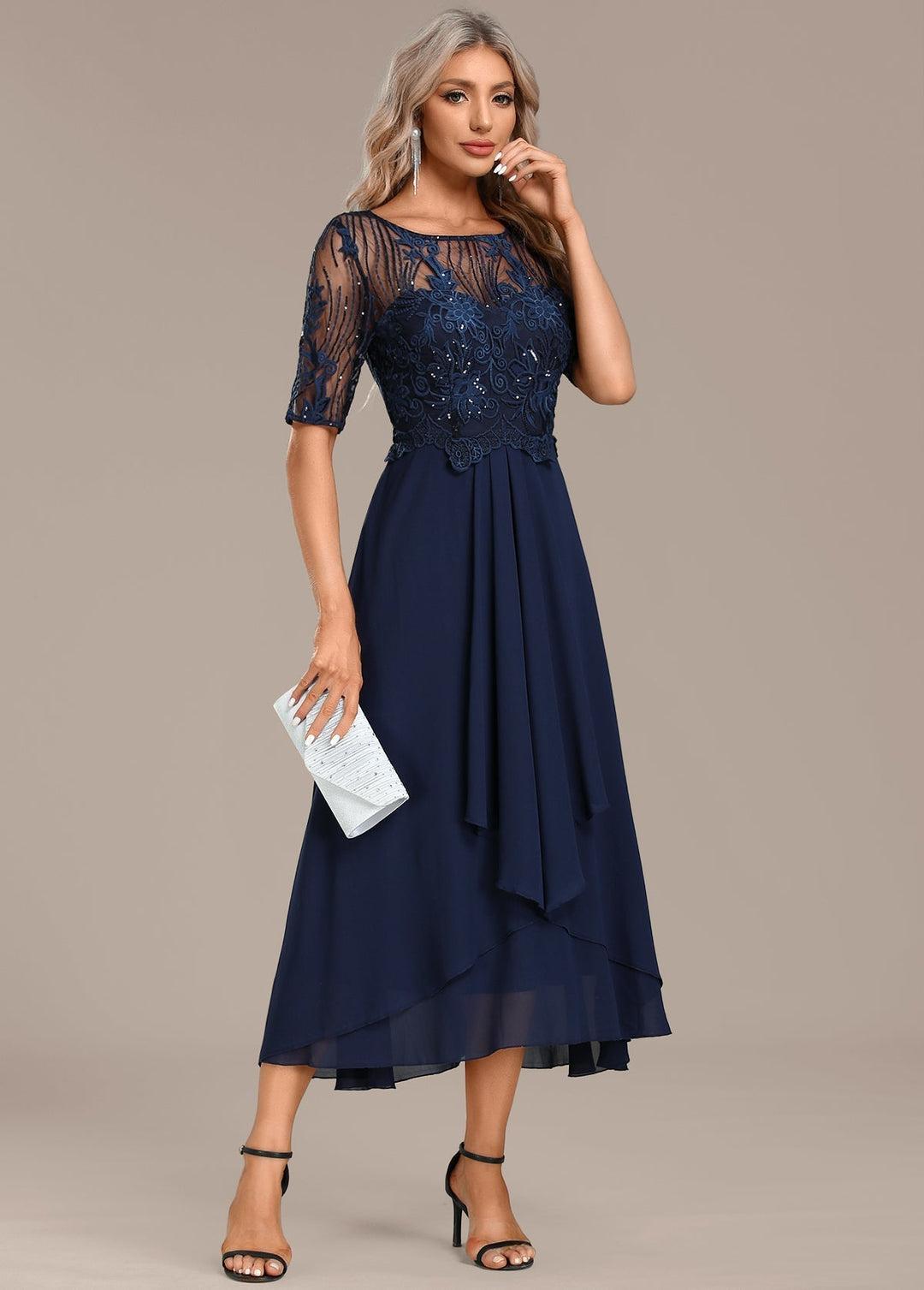 Elegant navy lace midi dress for women, with a sophisticated design, short sleeves, and round neckline.
