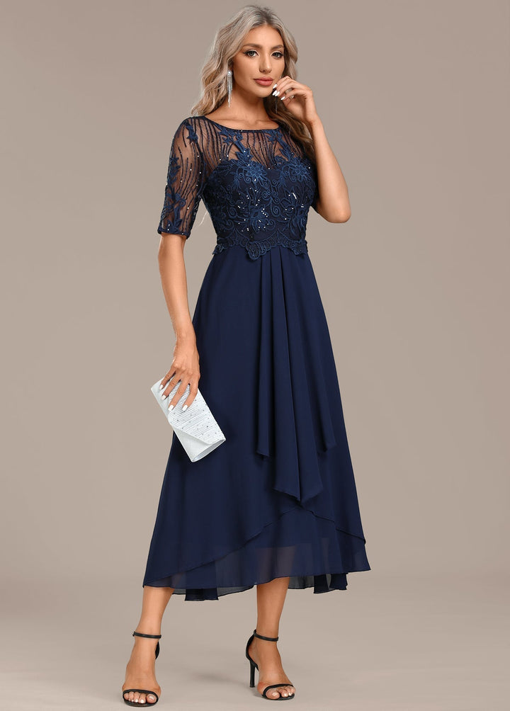 Elegant navy lace midi dress for women, with a sophisticated design, short sleeves, and round neckline.