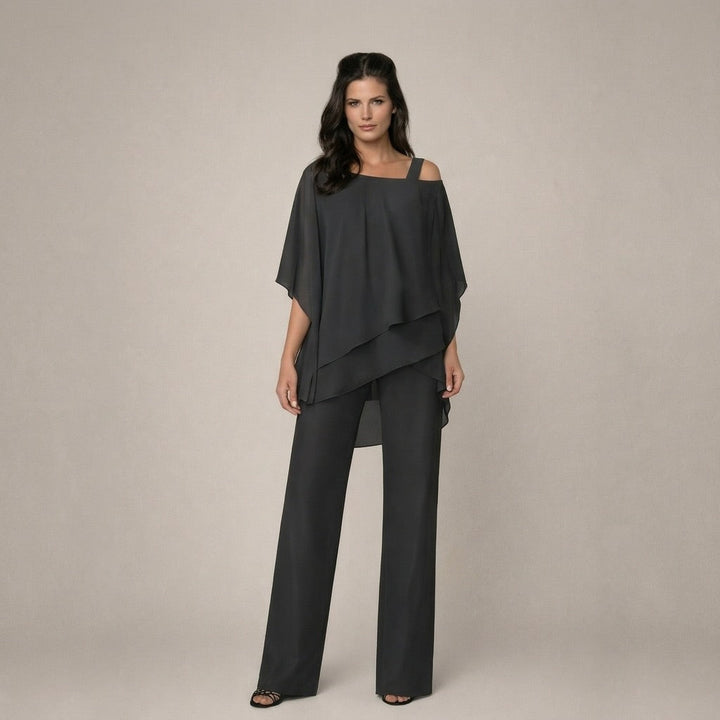 Stylish women's off shoulder top with flowing wide leg pants. Coordinated two-piece outfit for summer elegance.