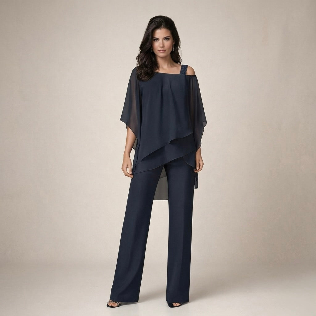 Chic women's off shoulder top from a matching set, paired with wide leg pants. Ideal for elegant summer fashion.