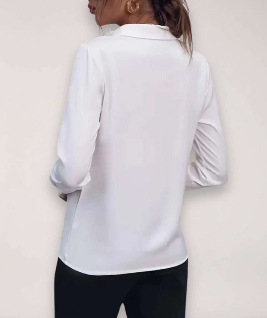Elegant women's professional button-down blouse, a versatile long-sleeve office shirt for business attire & formal wear.