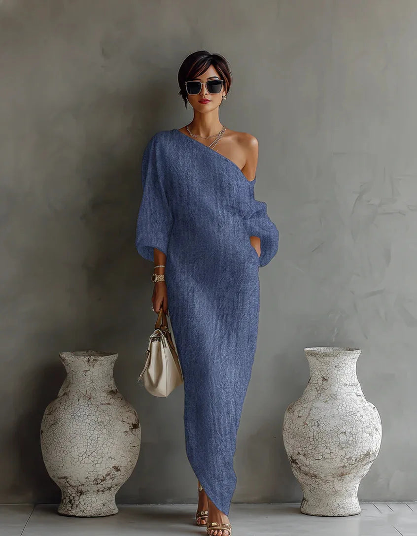 Women's elegant one-shoulder asymmetrical summer party dress, offering a relaxed and chic look.