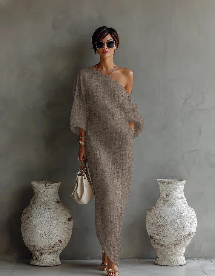 Sophisticated women's one-shoulder asymmetrical dress with a modern design for elegant casual wear.
