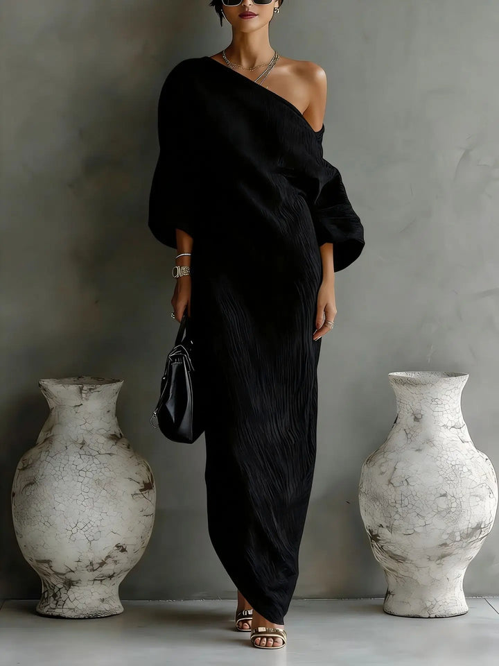 Flowing women's one-shoulder asymmetrical dress, an elegant choice for summer evenings and parties.