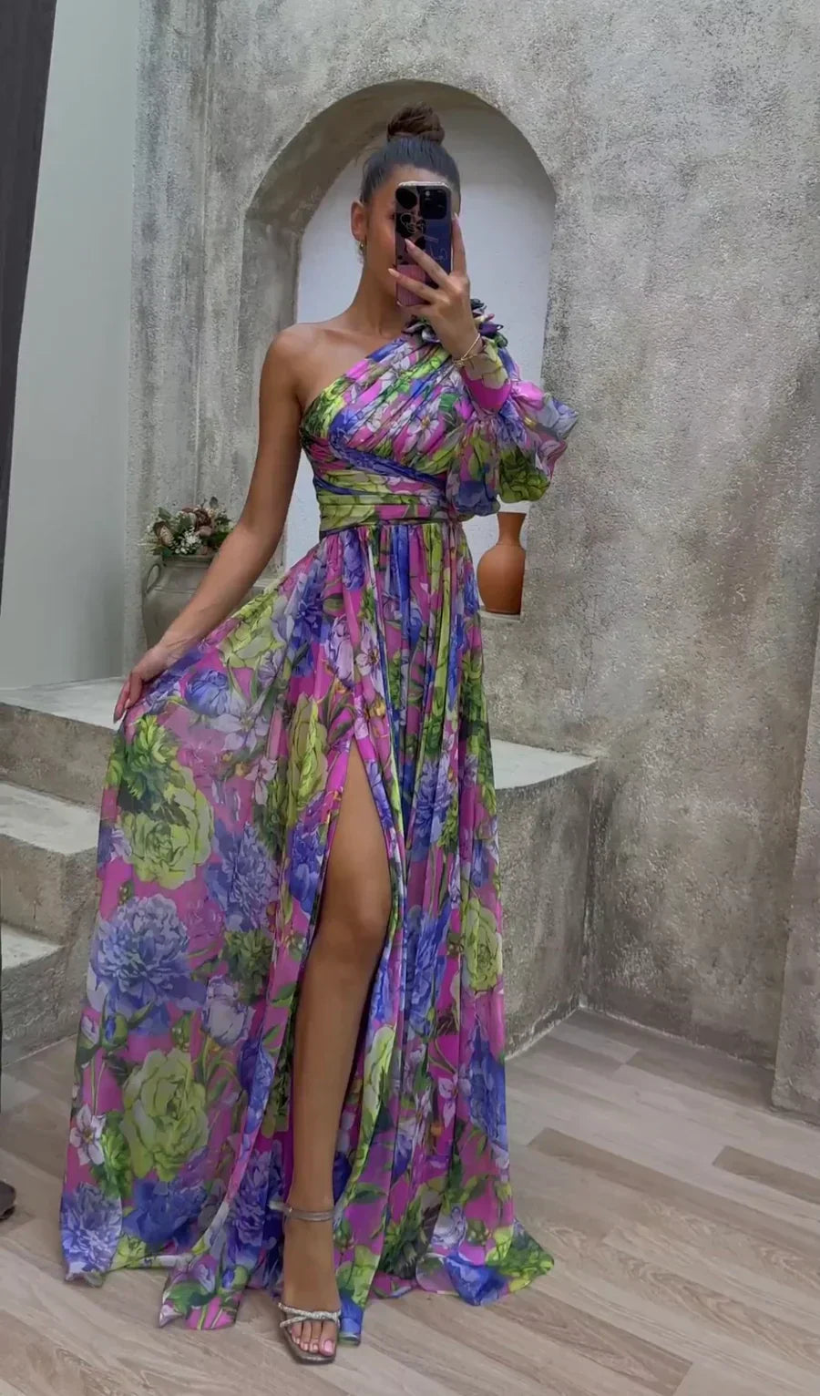 Elegant women's one-shoulder floral maxi dress with a flowy split hem, perfect for summer parties.