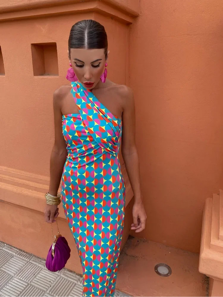Women's one-shoulder maxi dress featuring a vibrant geometric print, ideal for a stylish summer look.