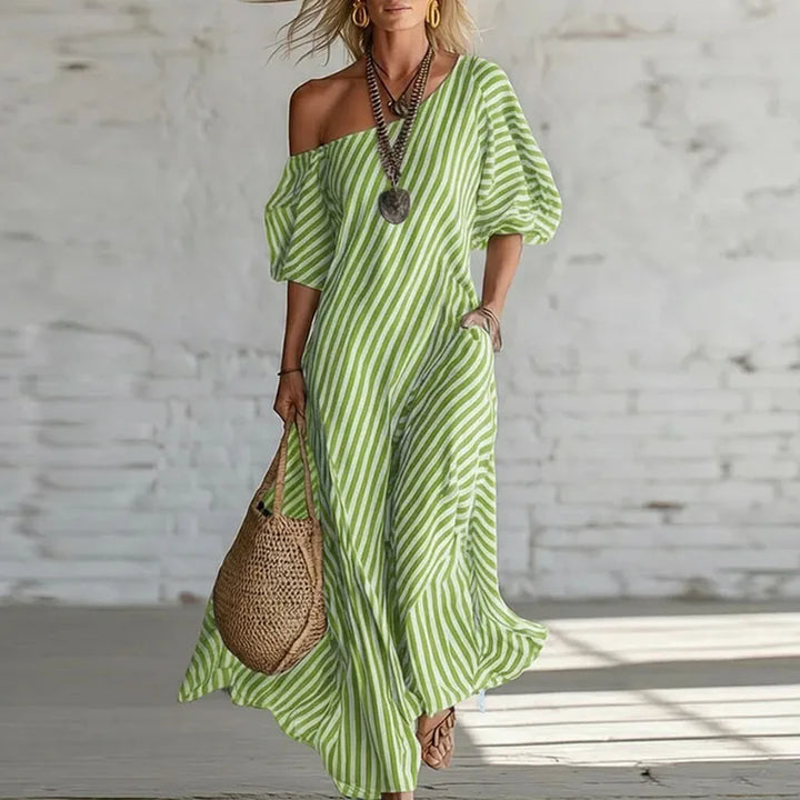 Stylish women's one-shoulder puff sleeve dress. Flowy midi length, versatile for elegant or casual summer wear.