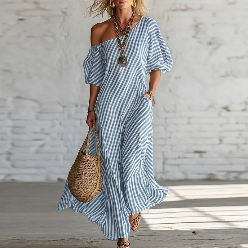 Elegant striped one-shoulder puff sleeve midi dress for women. Stylish & flowy, great for summer fashion.